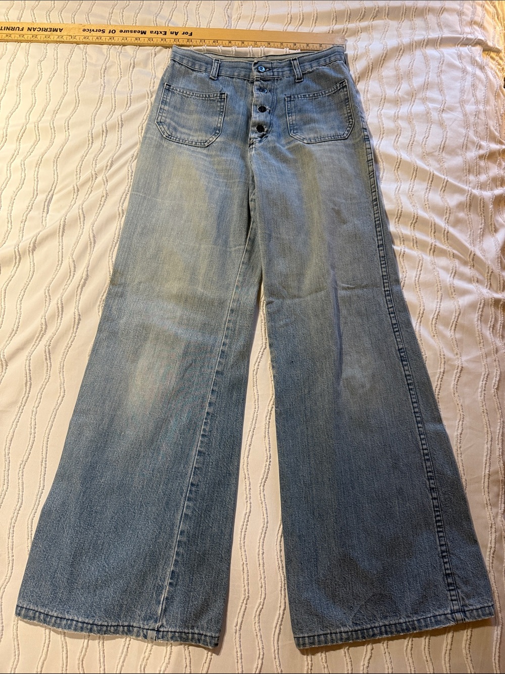 High-Rise Light Blue Wide-Leg Jeans with Button Front